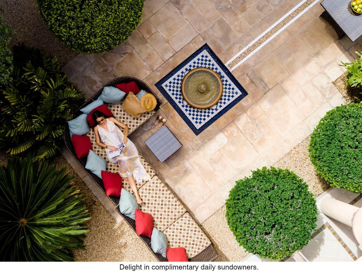 Jumeirah Dar Al Masyaf Dubai Dış mekan fotoğraf The courtyard at the Four Seasons Hotel, Marrakech